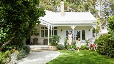 Alexandra Nea's white weatherboard home, verandah and garden