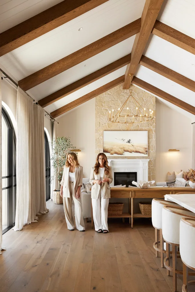 Alisa and Lysandra Brighton bungalow living room exposed beams wooden floor