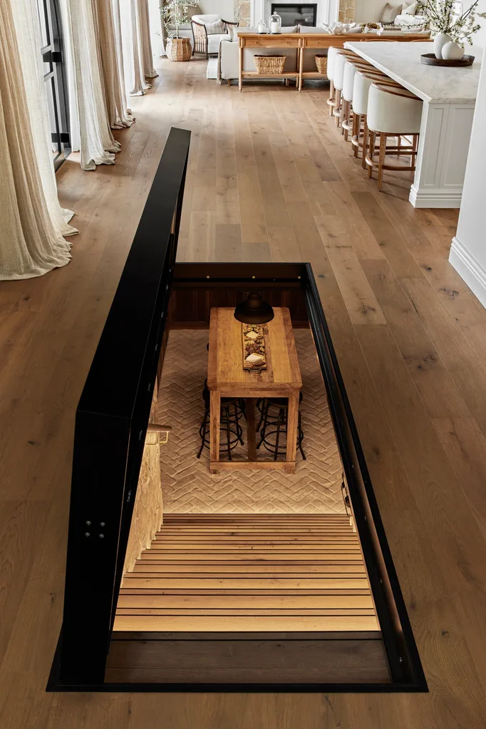 Alisa and Lysandra Brighton bungalow wine cellar door in floor