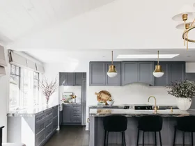 A grey blue kitchen inside a modern melbourne home.