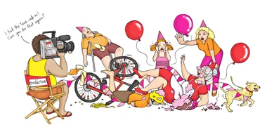 Director filming chaos with fallen bicycle, cake, balloons, and party hats; speech bubble says lens cap was on.
