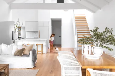 A growing family renew and expands their beloved beach house