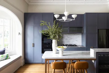 modern kitchen with blue cabinets