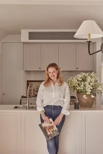 Elle Lovelock in her contemporary renovated kitchen.