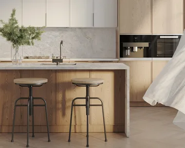 A kitchen with stone benchtops from Neolith in new colour Everest Sunrise.