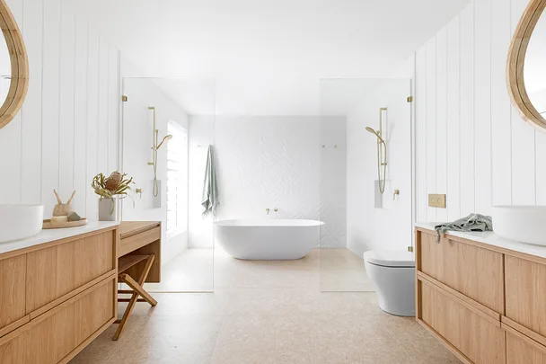 Modern coastal bathroom with timber vanity organic timber mirror, double showers and freestanding bathtub