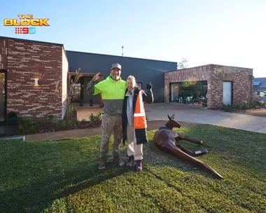 Sonny and Alicia's front yard with a kangaroo sculpture.