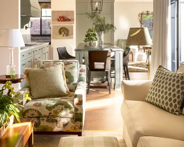 A sunny kitchen and living area.