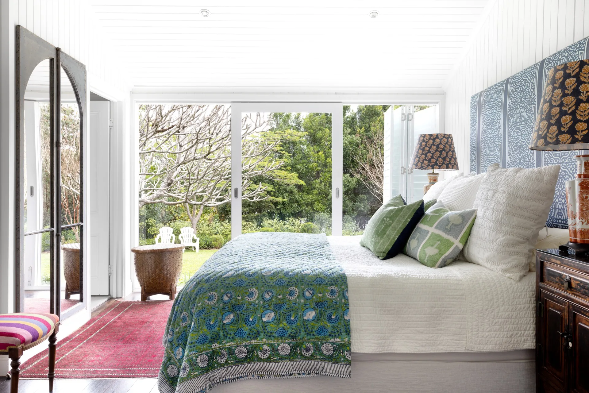 The main bedroom opening onto the cottage garden.