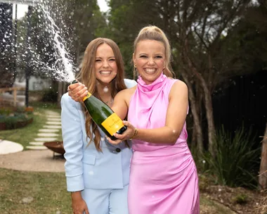 The Block 2024 winners Maddy and Charlotte Popping Champagne