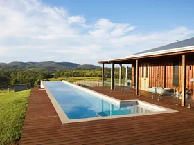 Timber family home with a pool.