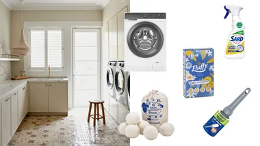 laundry room with products that are used in the laundry process, including a washing machine and dryer