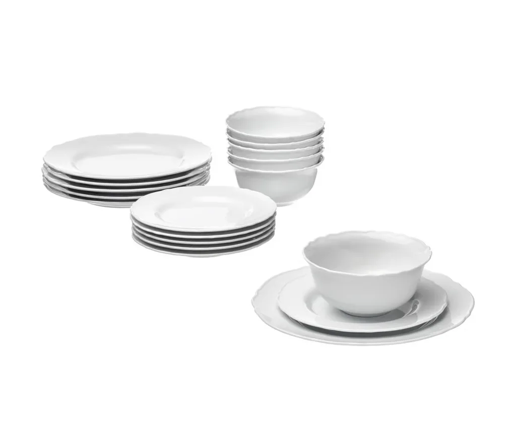 Product shot of the IKEA Uplagga White Dinner Set (18-piece) ranked our best Dinnerware Set for (Surprisingly) Inexpensive Porcelain. The set has a beautiful translucent quality and delicately detailed edges.